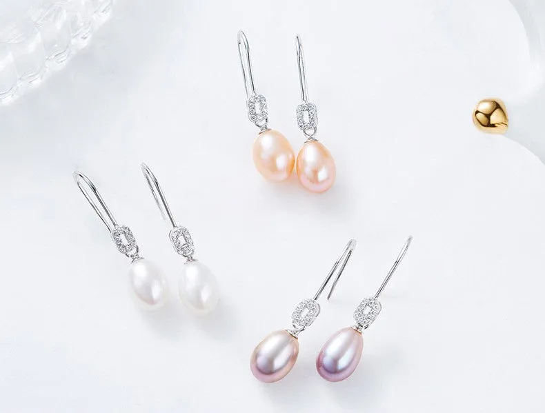 Sterling silver elegant dangling pearl earring